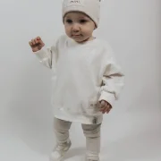 Oversize Baby Sweater Creme-Weiß aus weichem Soft Waffelstrick mit Mini Patch handgemacht