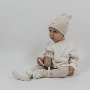 Bequemer Oversize Baby Pullover Creme-Weiu00df luftiger Waffelstrick fu00fcr Kleinkinder